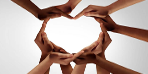 image - arms coming in from all sides with the hands joining and forming the shape of a heart.